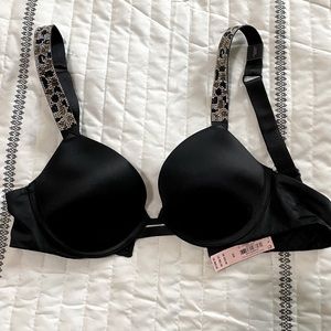 Brand new Victoria’s Secret Black bra with sparkly straps. 32 B